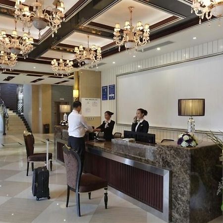 Wenhua Herton Hotel Qionghai Exterior foto